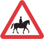 jeźdźcy lub prowadzący konie lub kucyki